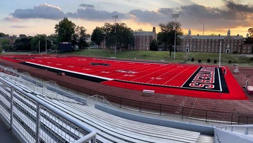 Clark Atlanta University's football program replaces its aging turf with a new red one, thanks to a grant from the Blank Family Foundation.