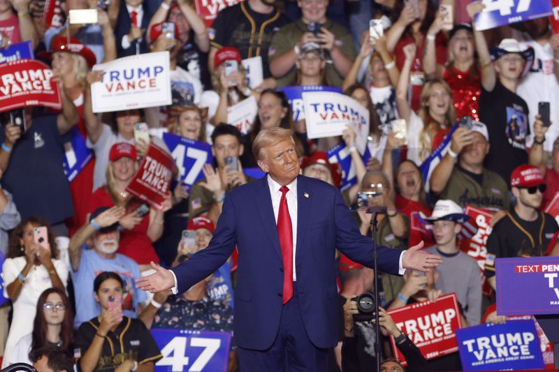 Republican presidential nominee former President Donald Trump arrives to speak at a campaign rally at the Mohegan Sun Arena at Casey Plaza in Wilkes-Barre, Pa., Saturday, Aug. 17, 2024. (AP Photo/Laurence Kesterson)