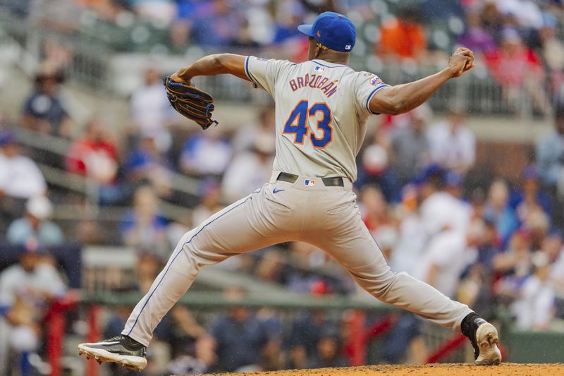 New York Mets pitcher Huascar Brazoban throws in the sixth inning of a baseball game against the Atlanta Braves, Monday, Sept. 30, 2024, in Atlanta. (AP Photo/Jason Allen)