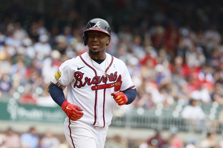 Braves score 4 in 11th, top Rockies 6-2, spoil uniform debut