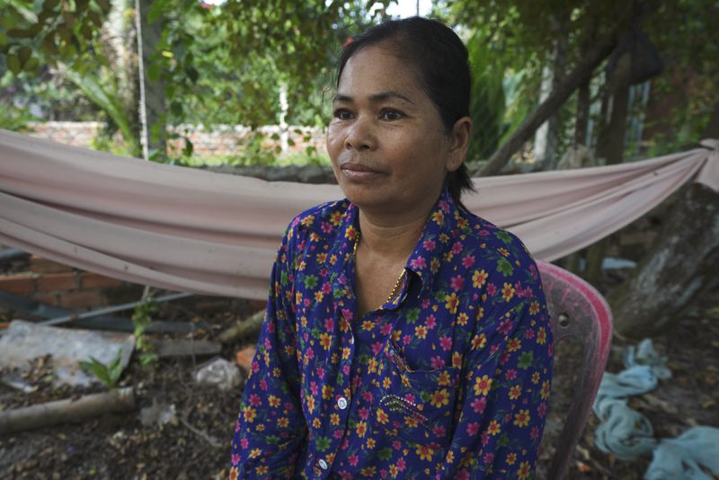 Norng La, a villager who lives along the Funan Techo Canal, is interviewed by The Associated Press at her home at Prek Takeo village eastern Phnom Penh Cambodia, Tuesday, July 30, 2024. (AP Photo/Heng Sinith)