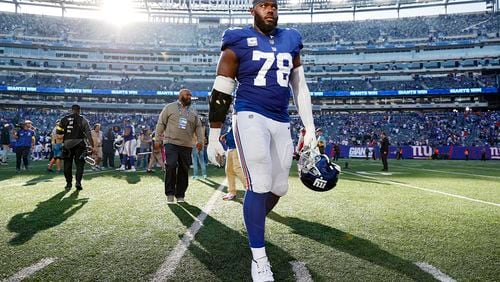 Andrew Thomas (78) of the New York Giants reacts as he walks off the field after defeating the Baltimore Ravens 24-20 at MetLife Stadium on October 16, 2022, in East Rutherford, New Jersey. (Sarah Stier/Getty Images/TNS)