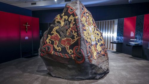 A replica of a Jelling Stone at Fernbank Museum of Natural History. It's part of the "Vikings: Warriors of the Sea" exhibit, which explores Viking culture, society and technology, art, traditions, beliefs. crucifix and Jelling Stone as a discussion of Viking religious beliefs. (John Spink / John.Spink@ajc.com)