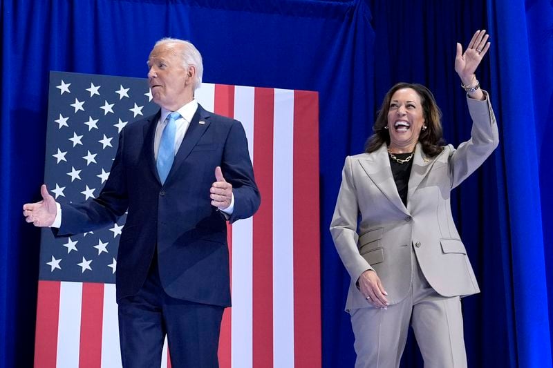 President Joe Biden, left, and Democratic presidential nominee Vice President Kamala Harris arrive to speak about the administration's efforts to lower costs during an event at Prince George's Community College in Largo, Md., Thursday, Aug. 15, 2024. (AP Photo/Susan Walsh)