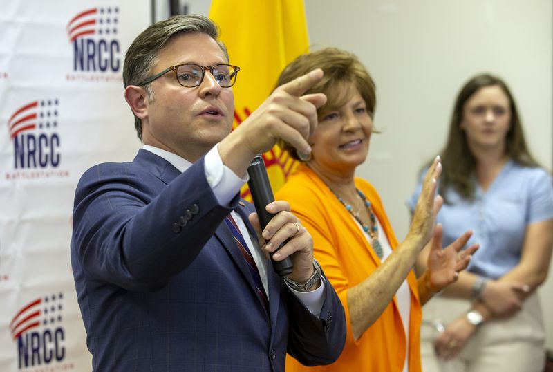 House Speaker Mike Johnson, left, and Republican U.S. House candidate Yvette Herrell of New Mexico answer questions from attendees of a campaign event in Las Cruces, N.M., Wednesday, Aug. 21, 2024. (AP Photo/Andres Leighton)