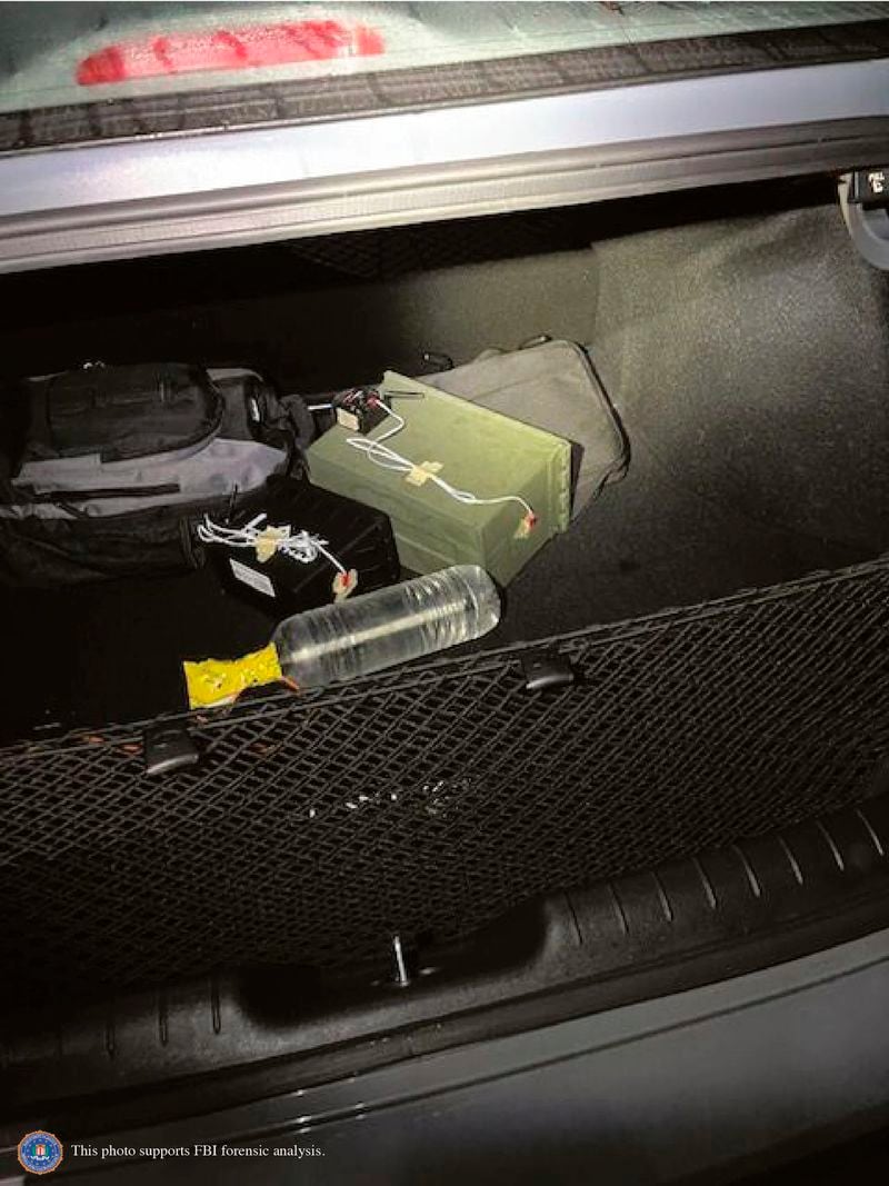 This image provided by the FBI shows two improvised explosive devises as initially discovered in Thomas Matthew Crooks' car at the scene in Butler, Pa., July 13, 2024. Crooks searched online for events of both former President Donald Trump and President Joe Biden and saw the Pennsylvania campaign rally where he opened fire as a "target of opportunity," a senior FBI official said. (FBI via AP)