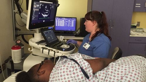 Shuntica Carroll gets an echocardiogram of her heart during a recent appointment at Children’s Healthcare of Atlanta at Scottish Rite. Shuntica, who was diagnosed with leukemia last year, recently found out she needs a heart. CONTRIBUTED