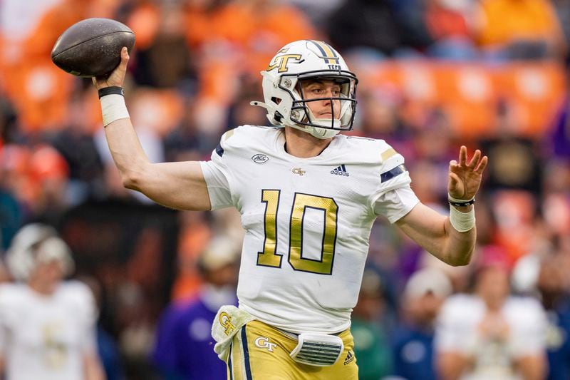 FILE - Georgia Tech quarterback Haynes King (10) passes the ball during the second half of an NCAA college football game against Clemson, Saturday, Nov. 11, 2023, in Clemson, S.C. (AP Photo/Jacob Kupferman, File)