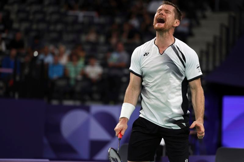 New Zealand's Wojtek Czyz reacts during his para badminton match against Britain's Daniel Bethell in Porte La Chapelle Arena during the Paralympic Games on Wednesday, Aug. 28, 2024, in Paris. (AP Photo/Samantha Hurley).