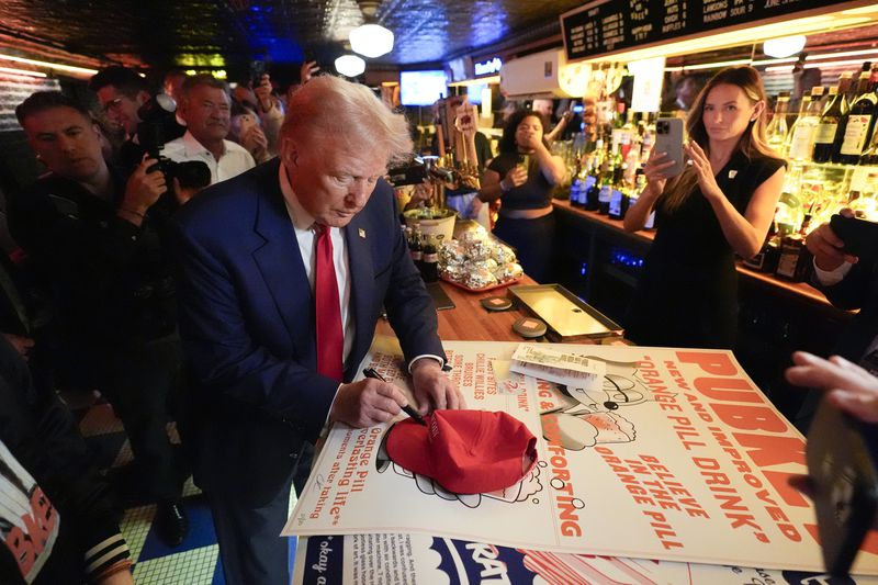 Republican presidential nominee former President Donald Trump makes a campaign stop at Pubkey Bar and Media House, Wednesday, Sept.18, 2024, in New York. (AP Photo/Alex Brandon)