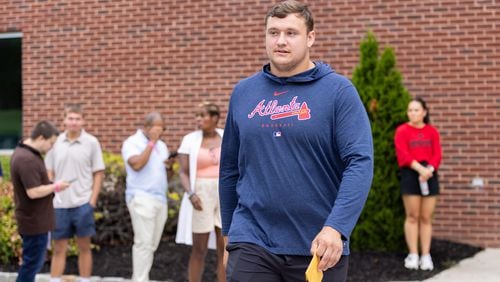 Falcons guard Chris Lindstrom arrives for Falcons training camp at the Falcons’ headquarters in Flowery Branch on Wednesday, July 24, 2024. (Arvin Temkar / AJC)