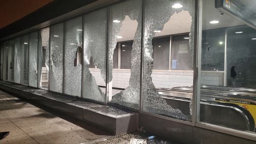 Vandals smashed windows at MARTA's Peachtree Center station Saturday. The agency suspended service when Atlanta initiated a 9 p.m. curfew. (MARTA PHOTO)