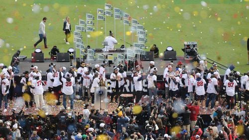 Atlanta Braves players celebrate as confetti fly over after the celebrations with the new World Series Champions at Truist Park on Friday, November 5, 2021. Miguel Martinez for The Atlanta Journal-Constitution 