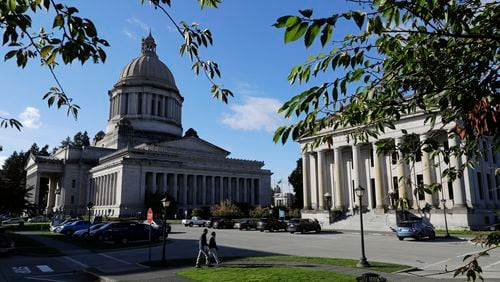 FILE - The Capitol in Olympia, Wash., is pictured Oct. 9, 2018. Five months after holding its presidential primaries, Washington state is looking further down the ticket to select candidates to compete for federal and state offices in the November 2024 elections. (AP Photo/Ted S. Warren, File)