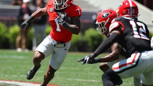 Georgia running back Trevor Etienne makes a long gain during the G-Day game on Saturday, April 13, 2024.