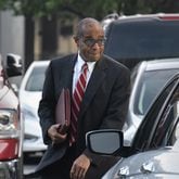 October 10, 2017 Atlanta - Elvin “E.R.” Mitchell Jr. walks to the federal court Tuesday morning, October 10, 2017. HYOSUB SHIN / HSHIN@AJC.COM