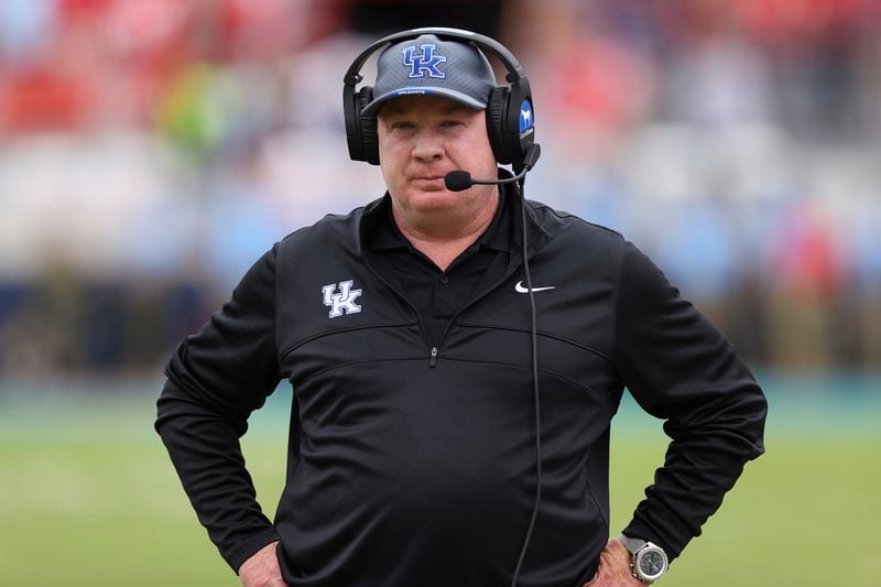 Kentucky head coach Mark Stoops looks on during the first half of an NCAA college football game against Mississippi Saturday, Sept. 28, 2024, in Oxford, Miss. (AP Photo/Randy J. Williams)