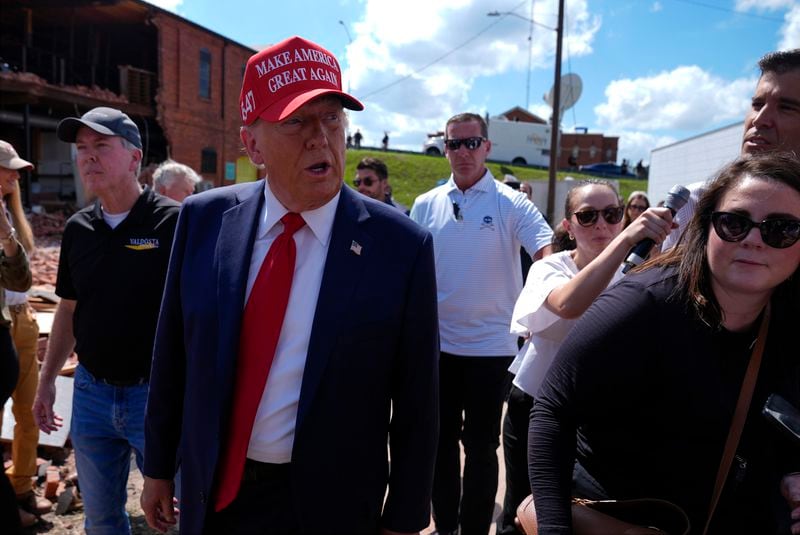 Republican presidential nominee former President Donald Trump visits Valdosta, Ga., a town impacted by Hurricane Helene, Monday, Sept. 30, 2024. (AP Photo/Evan Vucci)