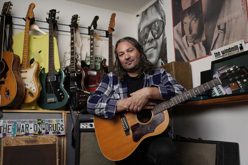 Adam Granduciel, leader of the band The War on Drugs, poses for a portrait at his studio on Monday, Aug. 26, 2024, in Burbank, Calif. (AP Photo/Chris Pizzello)