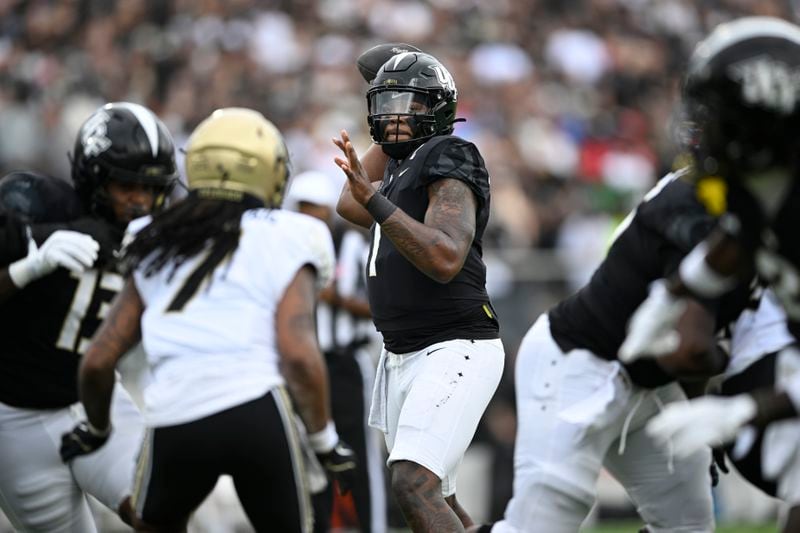 Central Florida quarterback KJ Jefferson (1) throws a pass against Colorado during the first half of an NCAA college football game, Saturday, Sept. 28, 2024, in Orlando, Fla. (AP Photo/Phelan M. Ebenhack)