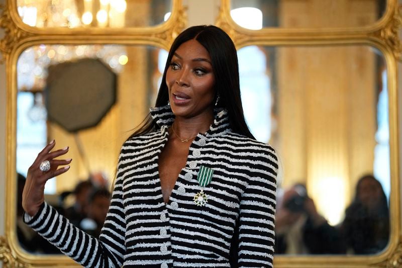 Naomi Campbell delivers a speech after being awarded with the medal of "Chevalier de l'Ordres des Arts et des Lettres", at the Culture ministry, in Paris, Thursday, Sept. 26, 2024. (AP Photo/Louise Delmotte)