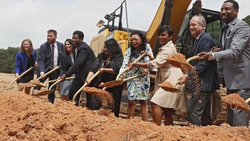 City officials at a groundbreaking ceremony for a housing development in Atlanta. AJC File