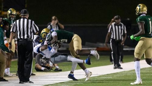 Newton County’s Zack Harden (1) tackles Grayson’s John Cineas (19) during a GHSA High School Football game between Grayson High School and Newton County High School at Grayson High School in Lawrenceville, GA., on Friday, September 29, 2023. (Photo/Jenn Finch)