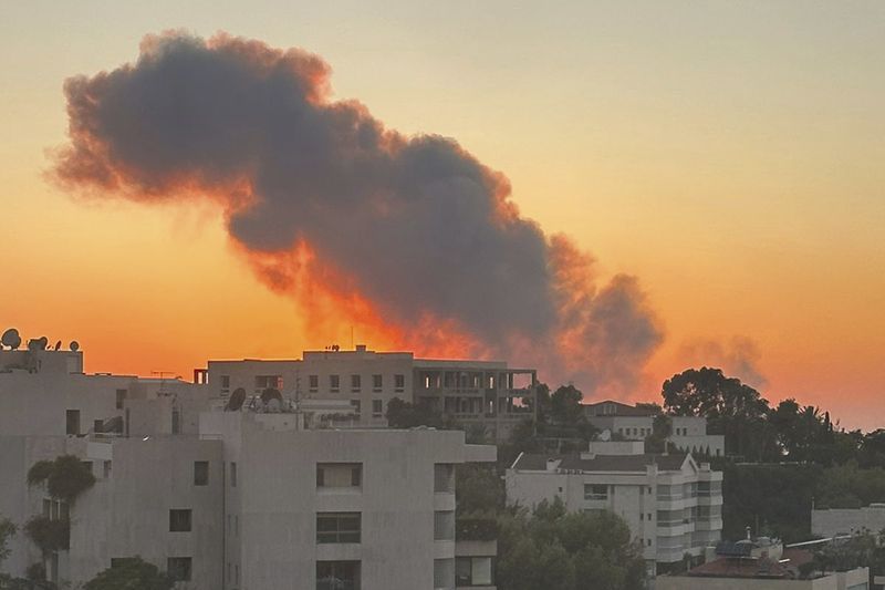 Smoke rises from Israeli airstrikes in Beirut, seen from Baabda, Friday, Sept. 27, 2024. (AP Photo)