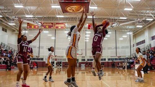 Union Grove guard Jordan Brooks (0) goes up for a layup  during a basketball game on February 27, 2024, in Atlanta, at Maynard Jackson High School. (Atlanta Journal-Constitution/Jason Allen)