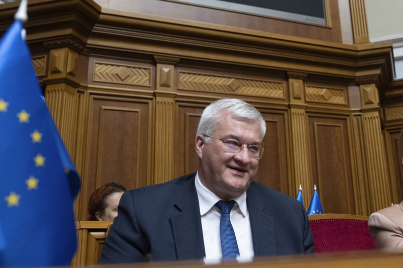 In this photo provided by the Ukrainian Parliament Press Office, Ukraine's newly appointed Foreign Minister Andrii Sybiha speaks in parliament in Kyiv, Ukraine, Thursday, Sept. 5, 2024. (Andrii Nesterewnko/Ukrainian Parliament Press Office via AP)