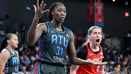 Atlanta Dream center Tina Charles (31) and Las Vegas Aces guard Kate Martin (right) react to a call during the second half at the Gateway Center Arena, Friday, July 12, 2024, in College Park. Las Vegas won 84-70. (Hyosub Shin / AJC)