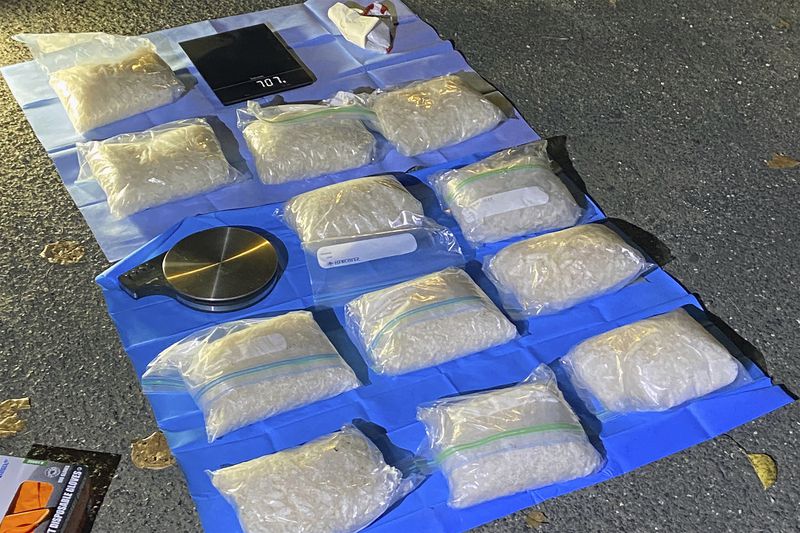 In this undated photo provided by the Australian Federal Police, illicit drugs are displayed after police have revealed on Wednesday, Sept. 18, 2024, that they have penetrated an encrypted global communications app developed for criminals called Ghost, leading to dozens of arrests. (Australian Federal Police via AP)