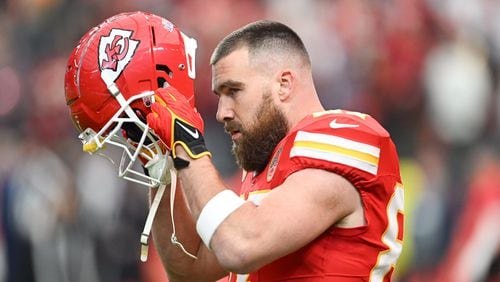 Kansas City Chiefs tight end Travis Kelce (87) puts on his helmet during warm-ups before Super Bowl LVIII, Sunday, Feb. 11, 2024, at Allegiant Stadium in Las Vegas. (Nick Wagner/The Kansas City Star/TNS)