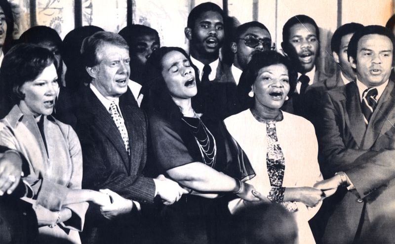 First Lady Rosalynn Carter, President Jimmy Carter, Coretta Scott King, Christine King Farris, sister of Dr. Martin Luther King, and U.N. Ambassador Andrew Young all sing during a reception held at the White House on Oct. 4, 1978, to honor Friends of Martin Luther King Jr. Center for Social Change. (AP file)