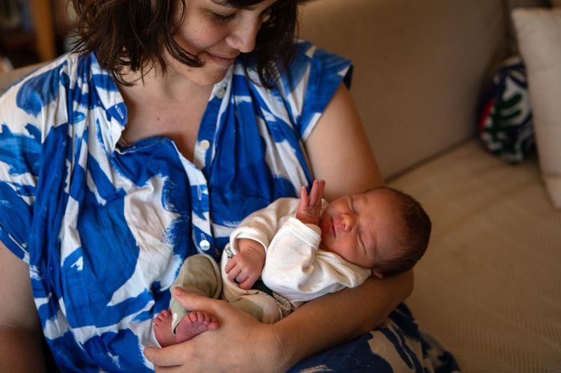 In this file photo, Megan Costello holds her one week old son Fintan Cummins in Los Angeles, California. It is especially important for people around infants to be up to date with their whooping cough vaccine. (Francine Orr/Los Angeles Times/TNS)