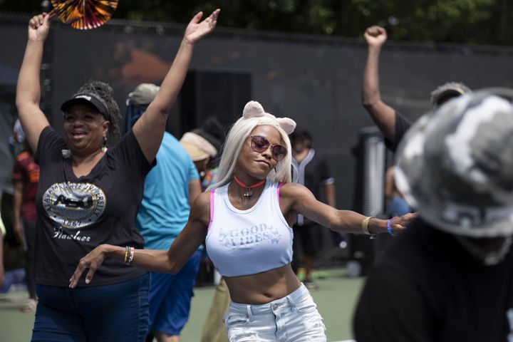 Stacey Smith dances to DJ Kemit during the 20th anniversary of the House In The Park music festival in Grant Park in Atlanta on Sunday, Sept. 1, 2024. (Ben Gray / Ben@BenGray.com)