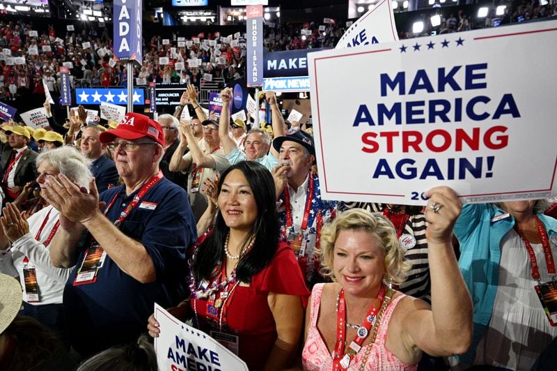 Georgia delegates, including Seanie Zappendorf (center), cheer during the third day of the Republican National Convention in Milwaukee.