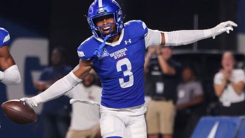 Georgia State defensive back Gavin Pringle (3) celebrates his interception returned 21-yards for a touchdown during the second half against Rhode Island at Center Parc Stadium, Thursday, August 31, 2023, in Atlanta. Georgia State won 42-35. (Jason Getz / Jason.Getz@ajc.com)