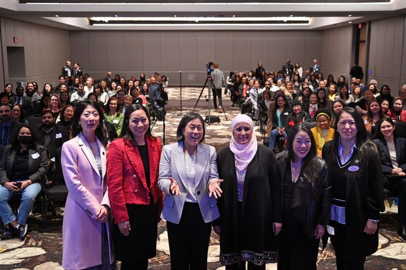 U.S. Trade Representative Ambassador Katherine Tai (third from left) and other speakers pose for a group photograph during Asian American, Native Hawaiian, and Pacific Islander (AA and NHPI) Economic Summit at Gas South Convention Center, Wednesday, Jan. 10, 2024, in Duluth. The White House Initiative on Asian Americans, Native Hawaiians, and Pacific Islanders (WHIAANHPI) hosted an economic summit in the metro Atlanta area in Georgia to connect Asian American, Native Hawaiian, and Pacific Islander (AA and NHPI) community members directly with federal leaders and resources. (Hyosub Shin / Hyosub.Shin@ajc.com)