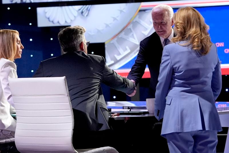 President Joe Biden, second right, and first lady Jill Biden, right, greet CNN event moderators Dana Bash, from left, and Jake Tapper following a presidential debate with Republican presidential candidate former President Donald Trump, hosted by CNN, Thursday, June 27, 2024, in Atlanta. (AP Photo/Gerald Herbert)