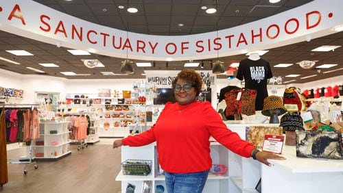 Aisha Taylor Issah, owner of The Sistah Shop at Atlantic Station in Atlanta, poses for a photo on Friday, Sept. 13, 2024. (Natrice Miller/ AJC)