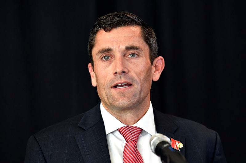 FILE - University of Louisville Athletic Director Josh Heard speaks with reporters during a press conference in Louisville, Ky., Nov. 3, 2022. (AP Photo/Timothy D. Easley, File)