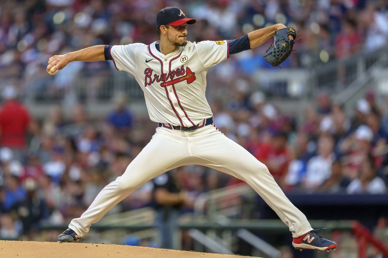 Atlanta Braves pitcher Charlie Morton throws in the first inning of a baseball game against the Los Angeles Dodgers, Sunday, Sept. 15, 2024, in Atlanta. (AP Photo/Jason Allen)