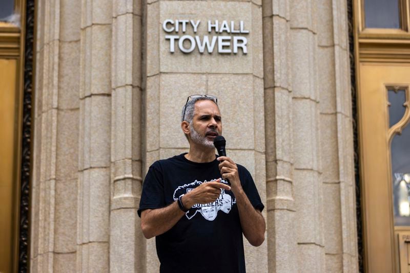 Kamau Franklin speaks at a protest against the under-construction law enforcement training center, known to some as Cop City, at City Hall in Atlanta on Monday, Sept. 16, 2024. It's been one year since opponents submitted a petition to force a referendum to block the project. (Arvin Temkar/Atlanta Journal-Constitution via AP)