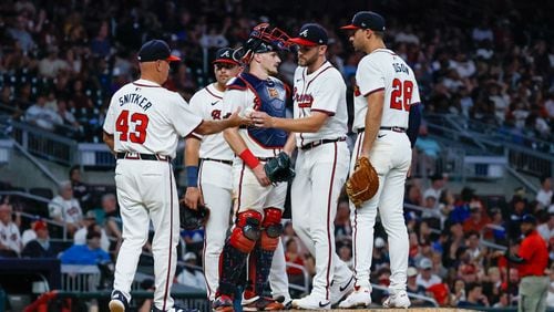 Braves manager Brian Snitker removes Dylan Lee from Thursday's game. (Miguel Martinez/ AJC)