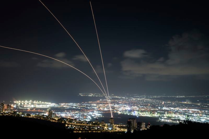 Israeli Iron Dome air defense system fires to intercept rockets that were launched from Lebanon, as seen from Haifa, northern Israel, Monday, Sept. 23, 2024. (AP Photo/Baz Ratner)