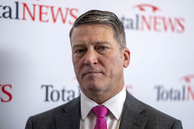 FILE - Rep. Ronny Jackson, R-Texas, speaks during a interview at CPAC, March 4, 2023, in Oxon Hill, Md. The House Ethics Committee said Monday, June 24, 2024, it was reviewing accusations that Jackson and Rep. Wesley Hunt, R-Texas, violated ethics rules by using campaign funds to pay membership dues at private social clubs. (AP Photo/Alex Brandon, File)