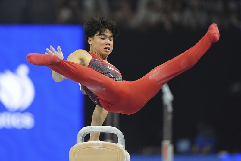 Asher Hong competes on the pommel horse at the United States Gymnastics Olympic Trials on Saturday, June 29, 2024, in Minneapolis. (AP Photo/Abbie Parr)
