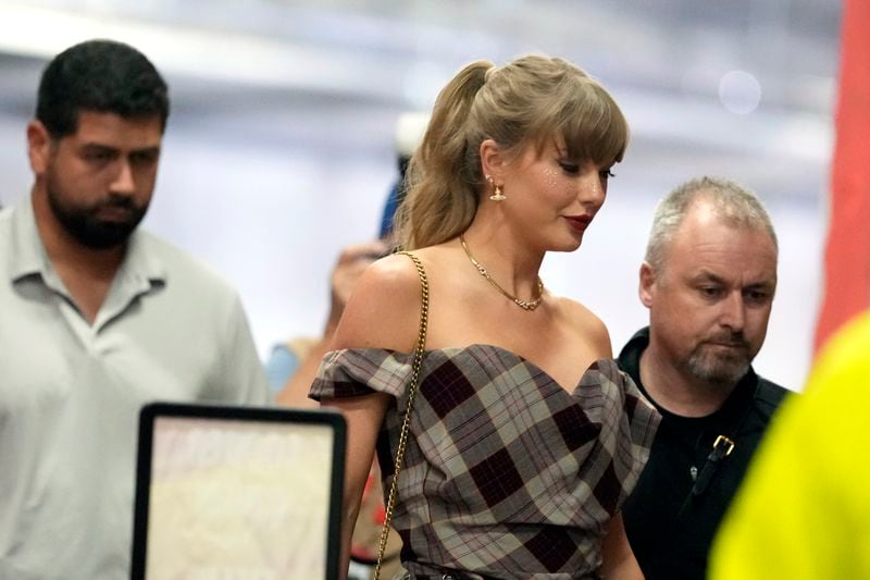 Taylor Swift arrives before the start of an NFL football game between the Kansas City Chiefs and the New Orleans Saints Monday, Oct. 7, 2024, in Kansas City, Mo. (AP Photo/Ed Zurga)