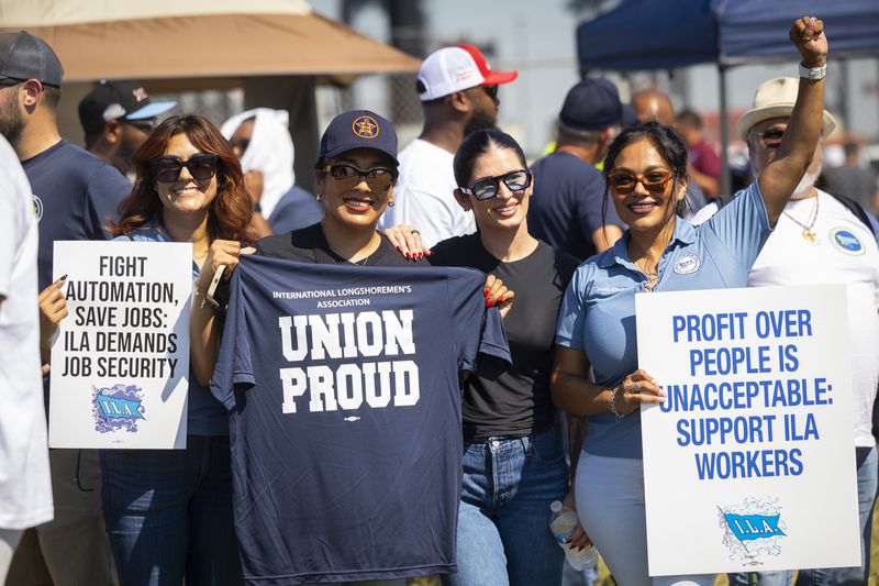 ILA members strike at the Bayport Container Terminal on Tuesday, Oct. 1, 2024, in Houston. (AP Photo/Annie Mulligan)